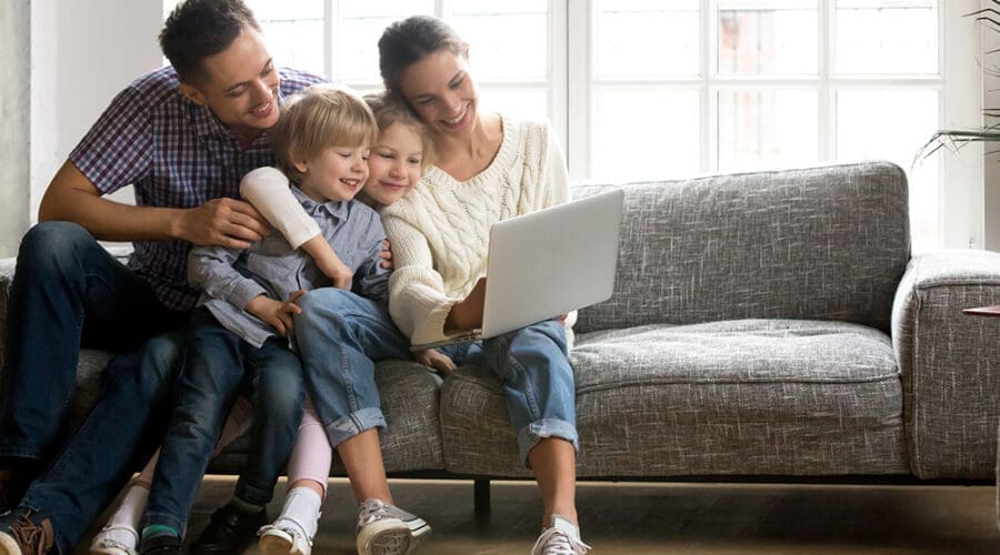 happy family with computer